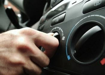 Hand turning car aircon knob